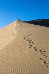 Golden sands of a singing dune in Kazakhstan