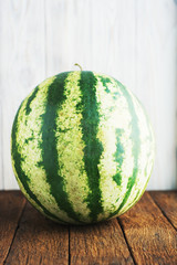 Fresh watermelon on wooden background