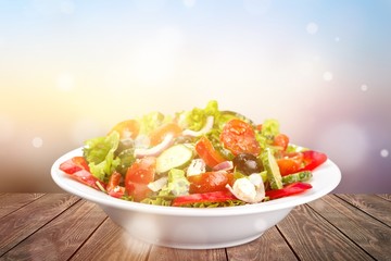 Photo of fresh salad with vegetables