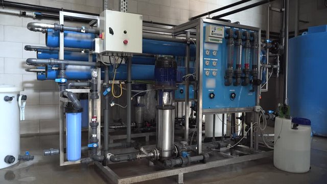 System of automatic treatment and multi-level filtration of drinking water produced from well. Plant or factory for production of purified drinking water