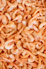Fresh shrimps prawns seafood on ice in the morning fish market
