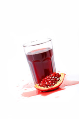 pomegranate juice on a white background