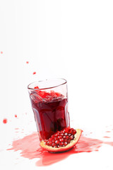 pomegranate juice on a white background