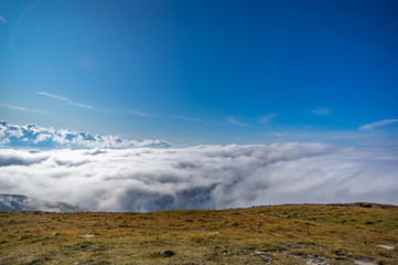 Mountains on a summer day in the fog
