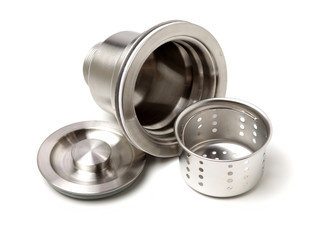 closeup of kitchen drain assembly on white background