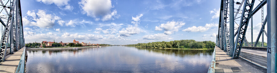 Fototapeta na wymiar Joseph Pilsudski Bridge on Vistula River in Torun. Kuyavian-Pomeranian Poland
