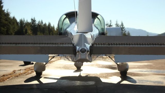 Rear view of airplane checking tail rudder and flaps