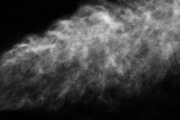 A stream of water and a cloud of drops