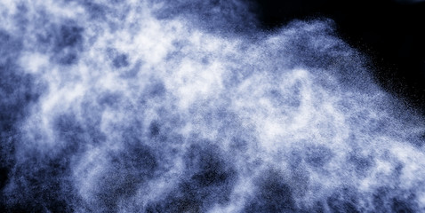 A stream of water and a cloud of drops