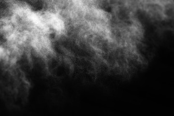 A stream of water and a cloud of drops