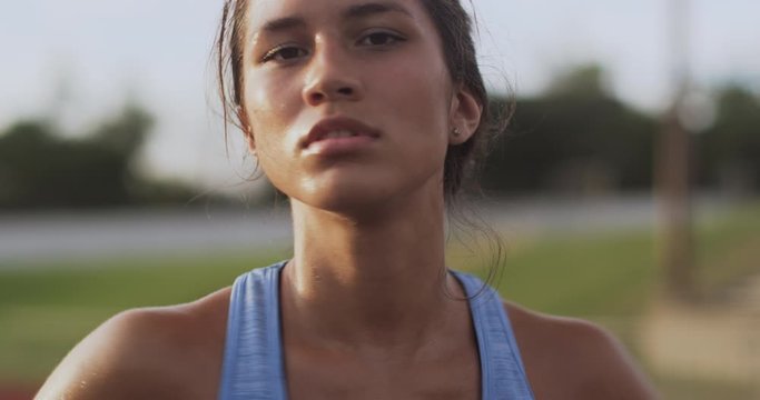 Mixed Race Athlete Stretching Before Workout