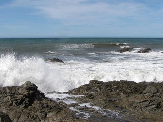 Waves over rocks