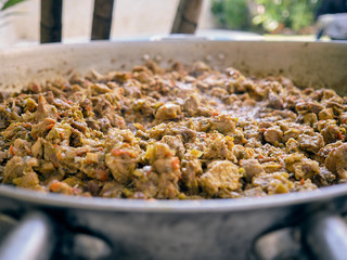 Meat, chicken and pork stew. Essential ingredient for the Venezuelan hallacas made in a big pan, saucepan, casserole, skillet, stewpan, stewpot