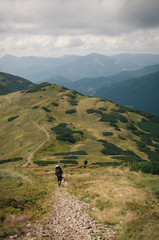 Obraz premium Hiking in the Low Tatra mountains in Slovakia, almost alone on the ridgeway, only majestic mountains
