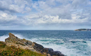 Obraz premium Galician seascape in Coitelada, Ares, La Coruña, Spain. Sea with a lot of waves breaking on the rocks