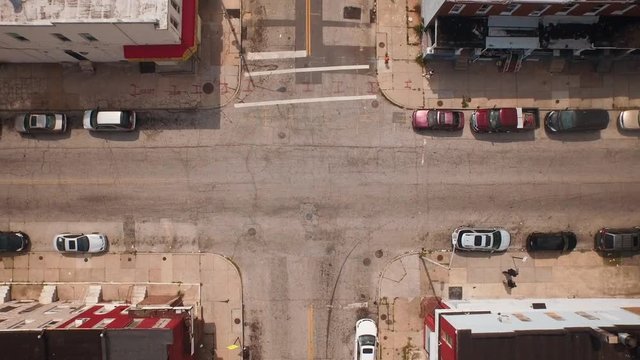Cars driving in urban intersection, Baltimore, Maryland, United States