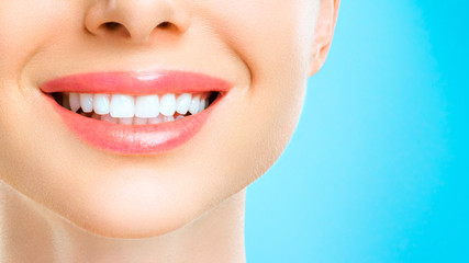 Obraz premium Perfect healthy teeth smile of a young woman. Teeth whitening. Dental clinic patient. Stomatology concept.