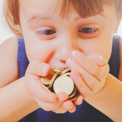 Best motivation is money. Humorous photo business child girl with coints.