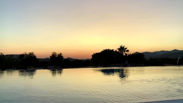 Beautiful sunset reflection over a pool in Dubrovnik Croatia with copy space