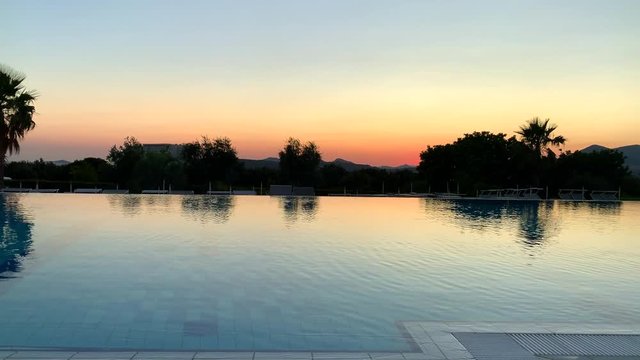 Beautiful sunset reflection over a pool in Dubrovnik Croatia with copy space