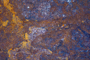 Abstract grunge rustic background. Colorful rusty background. Selective focus