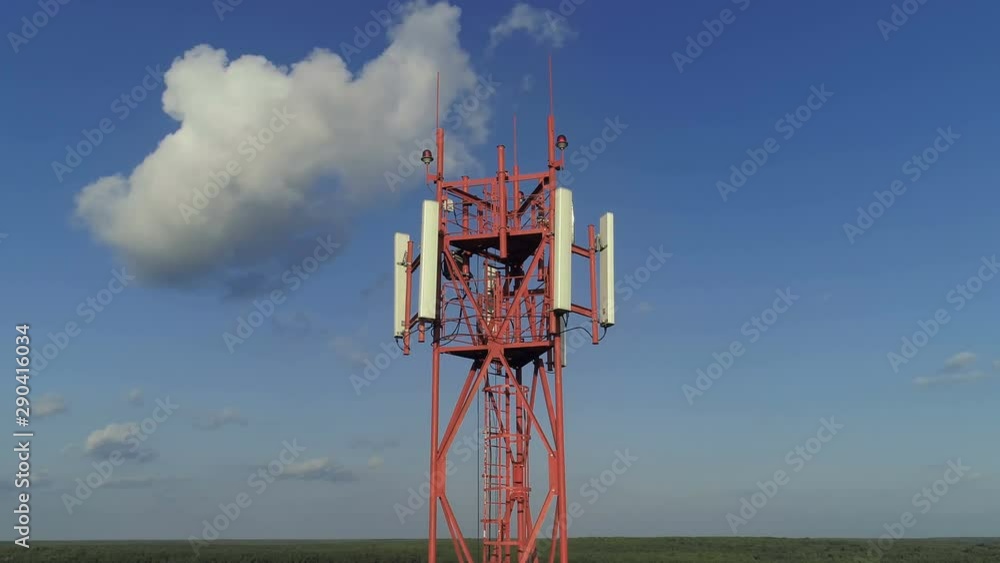 Wall mural aerial view of the telecom tower against blue sky