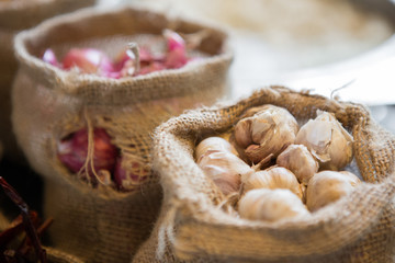 Close up of Garlic in cloth sacks