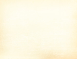 Old vintage paper with a glowing center and grunge vignette.