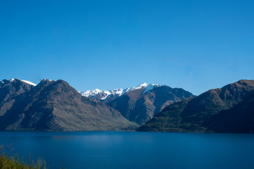 Stunning glacial lake coastal scenery in New Zealand Southern Alps