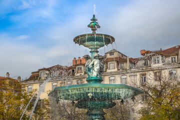 Famous Rossio Square fountain in historic center of Lisbon