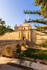 Fototapeta na wymiar Malta’s Mdina is one of Europe’s best preserved ancient walled cities and visitors are instantly transported back centuries upon crossing through its commanding gate.