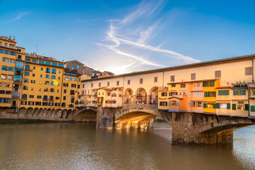 Fototapeta na wymiar Florence, Italy-June 16, 2019: Scenic beautiful Ponte Vecchio bridge in Florence historic city center