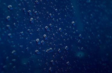water drops on blue surface