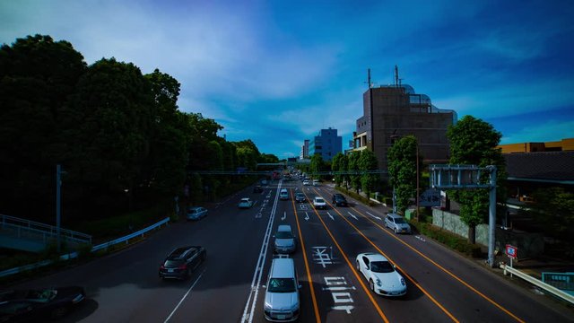 A timelapse of downtown street at Kanpachi avenue in Tokyo daytime wide shot