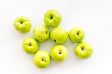 Autumn composition with green apple on white background top view copy space