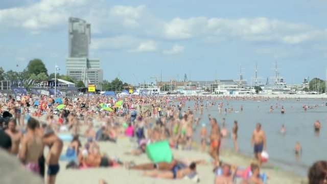 Beach in Gdansk, Poland.  23. August.  2019. Aerial view of the beach with overflows and people swimming in the Baltic Sea. Drone Shot 4K.