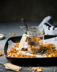 Granola with nuts, seeds and quinoa in a jar. Perfect healthy breakfast.