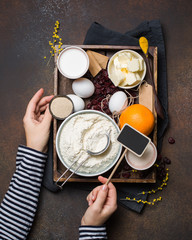Ingredients for cake with orange and cranberries