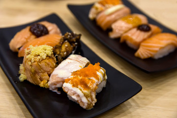 Top view of mix sushi salmon.
