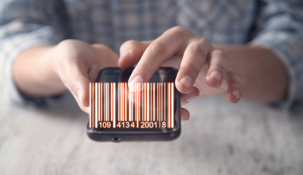 Business girl showing bar code. Warehouse, logistic and financial concept
