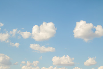 Blue sky with white beautiful cumulus clouds. Landscape sky clouds, background.