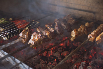 rack of lamb with grilled vegetables, decorated with sweet onion sweet onion on a white platter
