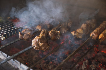 rack of lamb with grilled vegetables, decorated with sweet onion sweet onion on a white platter