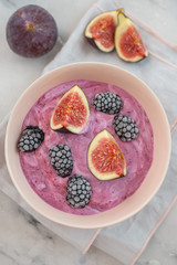 healthy yogurt with fresh figs on a table