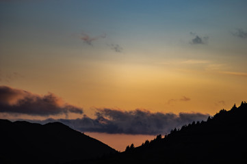 Clouds in the sky at sunset in the mountains