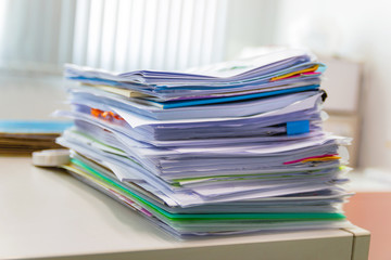 file folder and Stack of business report paper file on the table