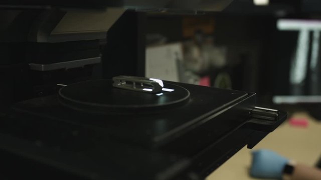 Microscopic inspection of metal parts examined at the atomic level slider shot