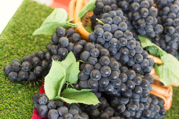 Basket full of fresh red grapes.