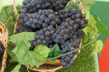 Basket full of fresh red grapes.
