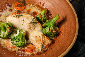 fish with broccoli (delicious fish dish, baked main course) menu concept. food background. copy...